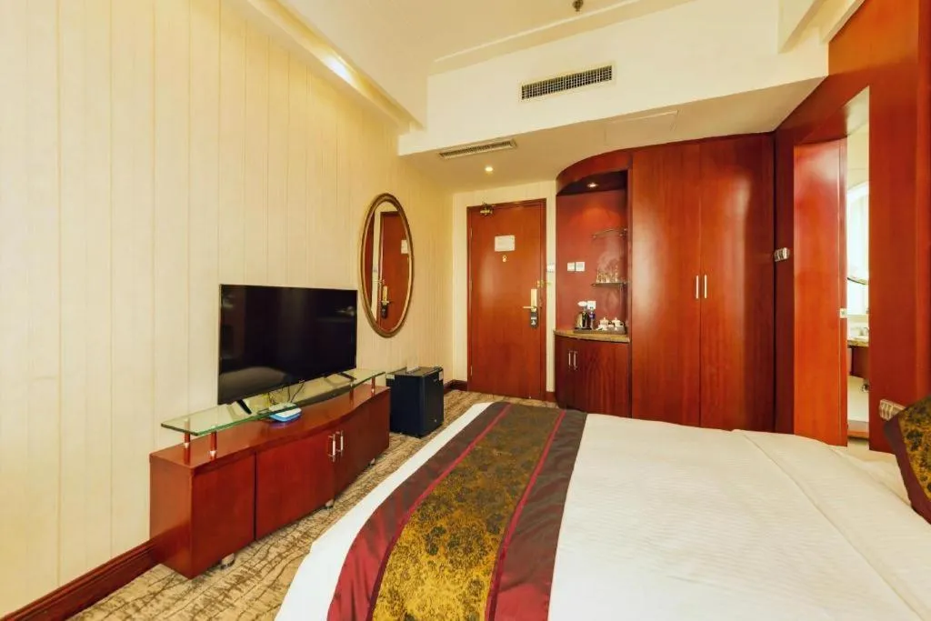 Bed in Junyu Grand Hotel Qinhuangdao