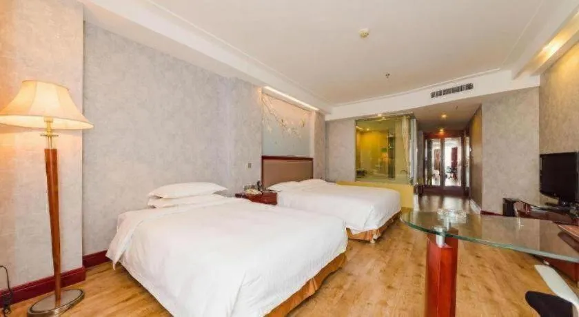 Bed in Junyu Grand Hotel Qinhuangdao