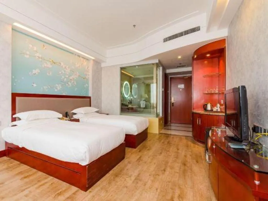 Bed in Junyu Grand Hotel Qinhuangdao