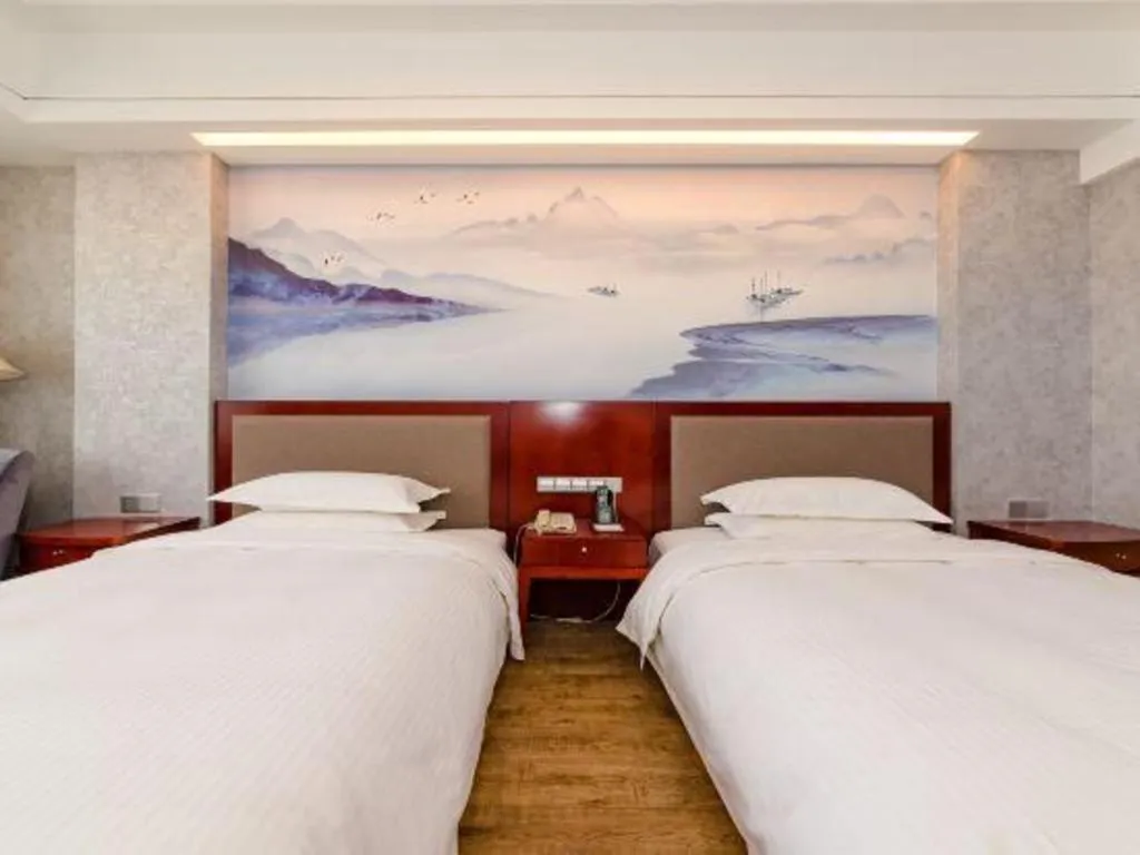 Bed in Junyu Grand Hotel Qinhuangdao