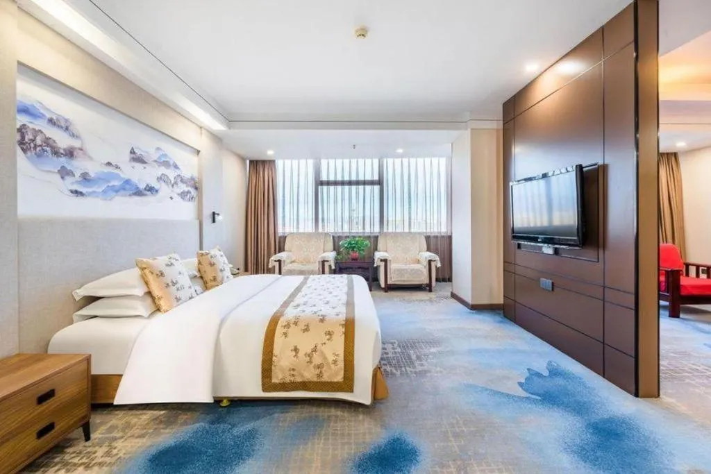 Bed in Junyu Grand Hotel Qinhuangdao