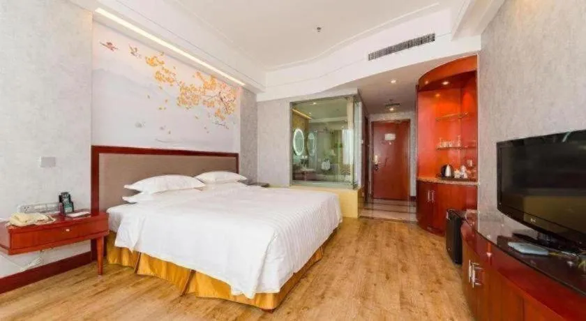 Bed in Junyu Grand Hotel Qinhuangdao