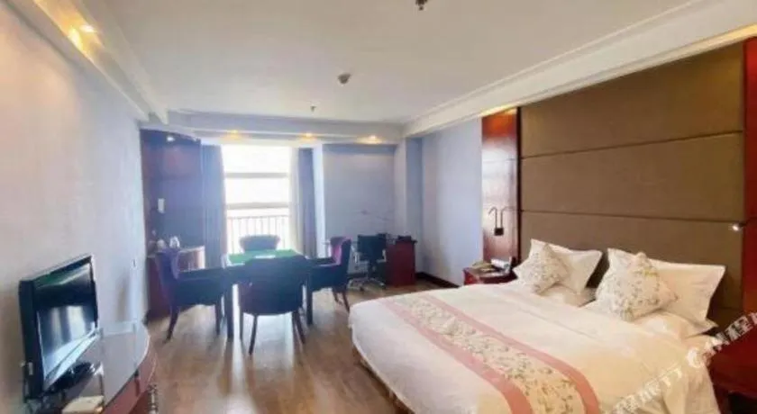 Bed in Junyu Grand Hotel Qinhuangdao