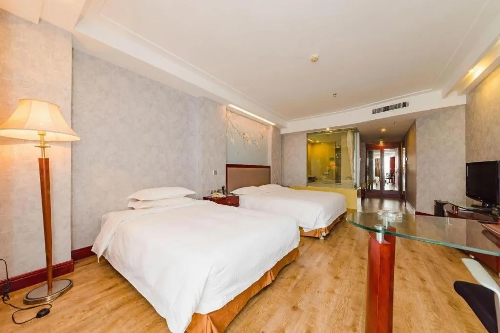 Bed in Junyu Grand Hotel Qinhuangdao