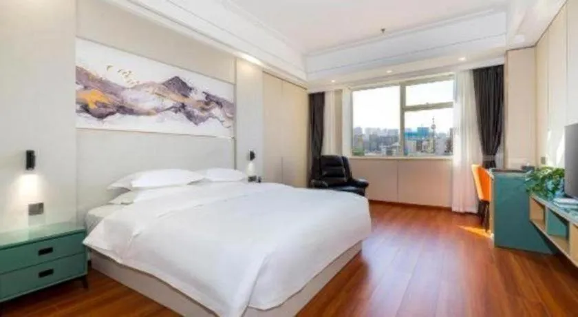 Bed in Junyu Grand Hotel Qinhuangdao