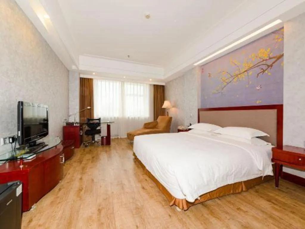 Bed in Junyu Grand Hotel Qinhuangdao