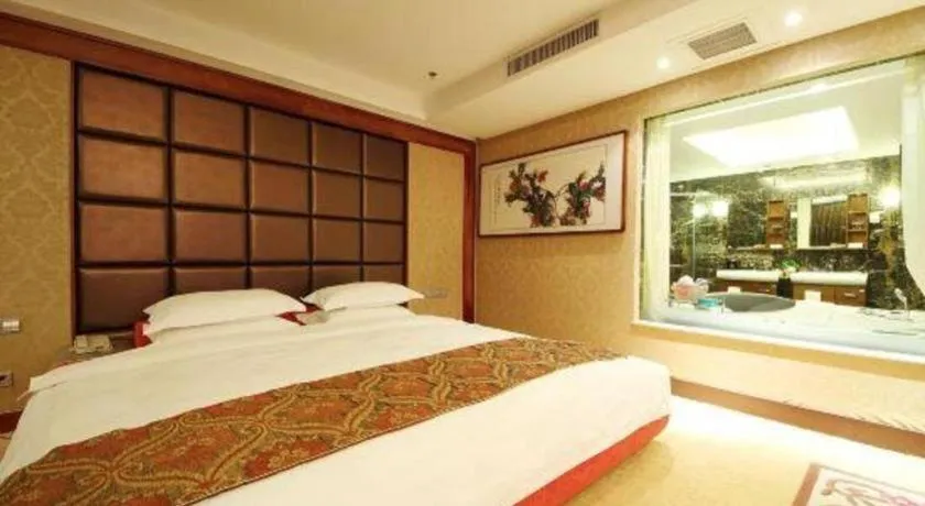 Bed in Junyu Grand Hotel Qinhuangdao