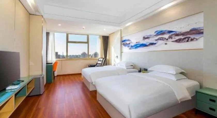 Bed in Junyu Grand Hotel Qinhuangdao