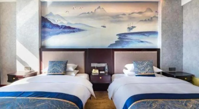 Bed in Junyu Grand Hotel Qinhuangdao