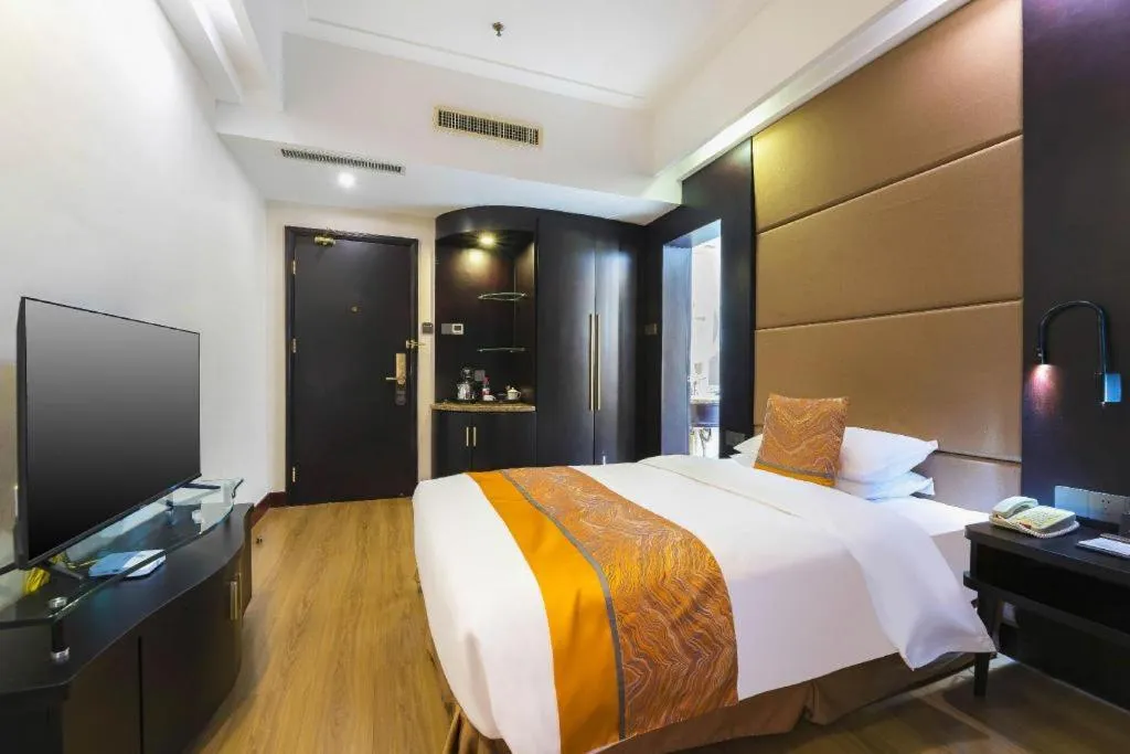 Bed in Junyu Grand Hotel Qinhuangdao