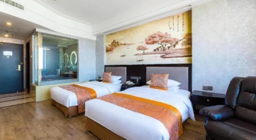 Bed in Junyu Grand Hotel Qinhuangdao