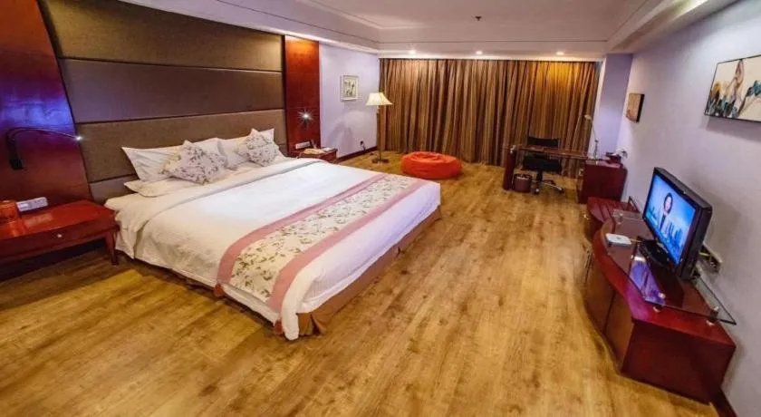 Bed in Junyu Grand Hotel Qinhuangdao