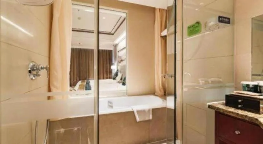 Bed in Junyu Grand Hotel Qinhuangdao