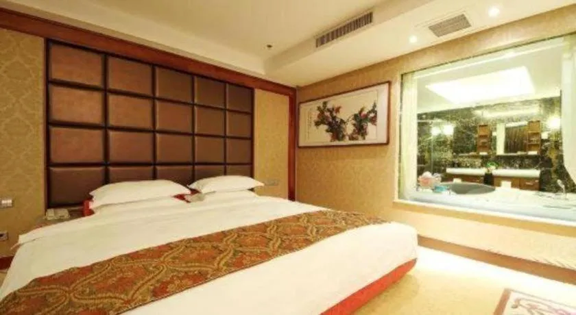 Bed in Junyu Grand Hotel Qinhuangdao