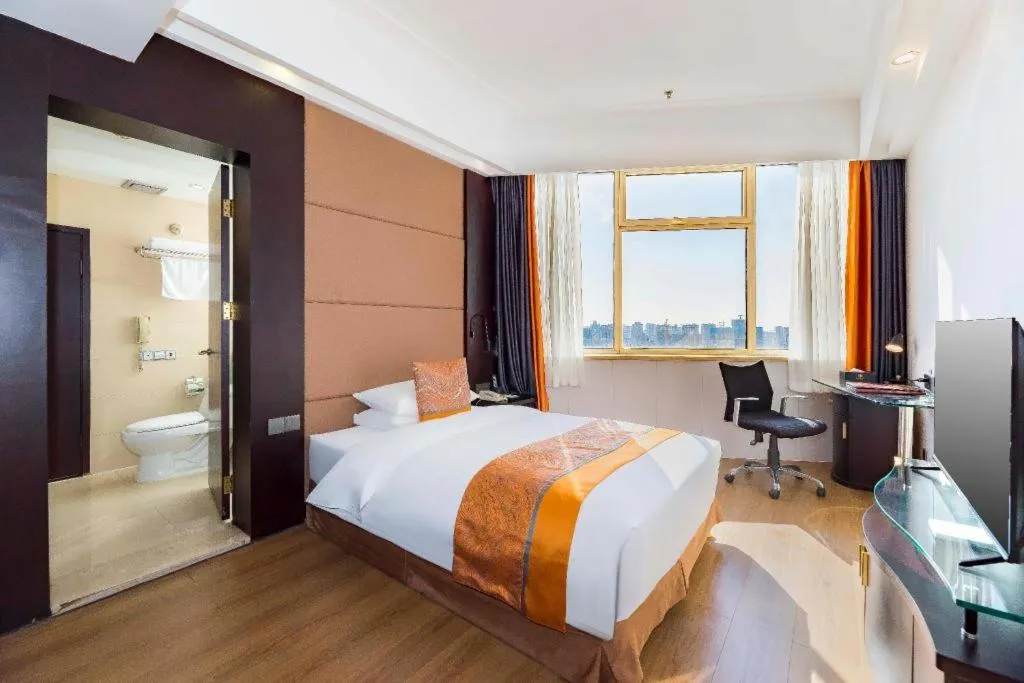 Bed in Junyu Grand Hotel Qinhuangdao