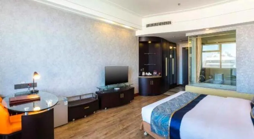 Bed in Junyu Grand Hotel Qinhuangdao