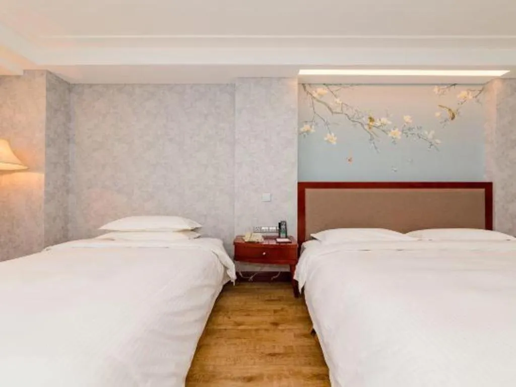 Bed in Junyu Grand Hotel Qinhuangdao