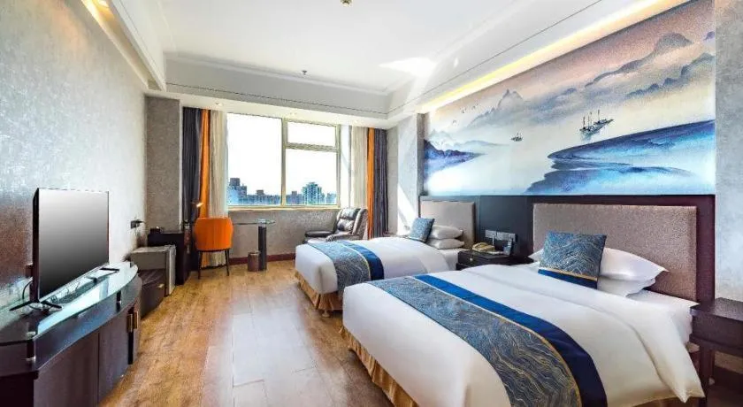 Bed in Junyu Grand Hotel Qinhuangdao