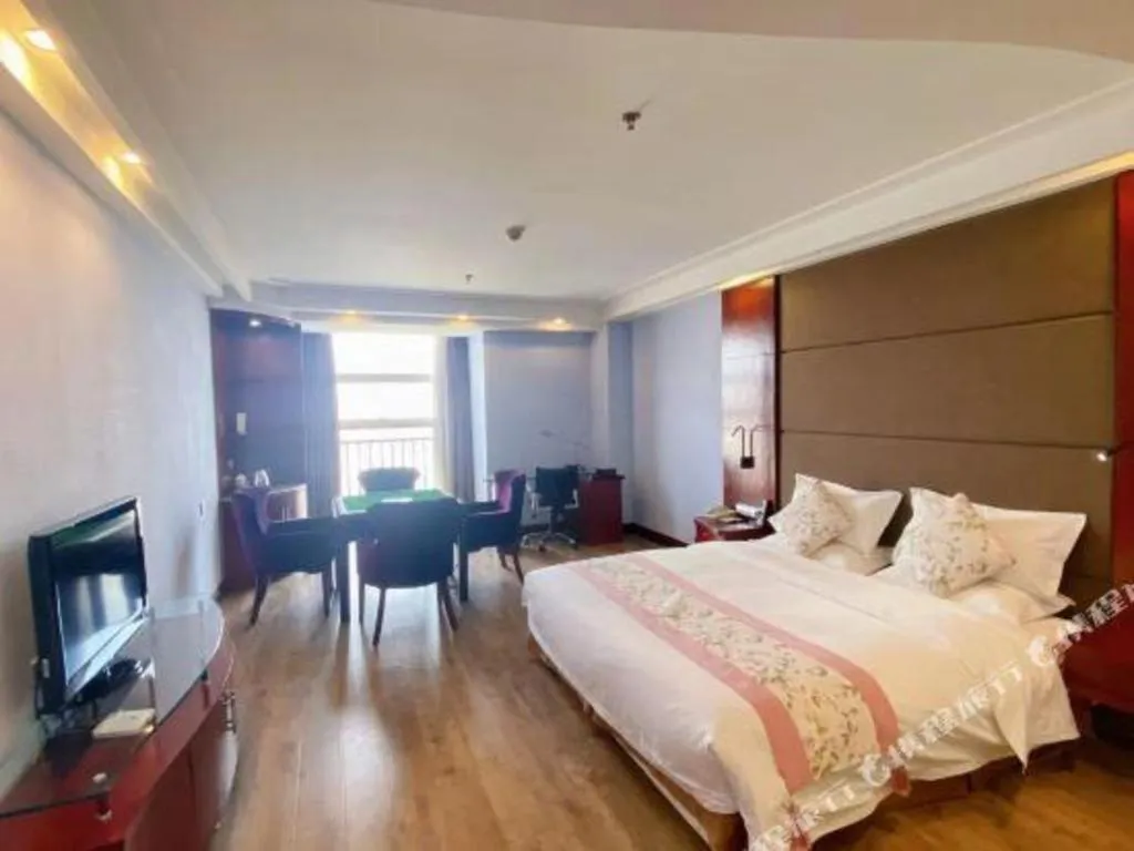 Bed in Junyu Grand Hotel Qinhuangdao