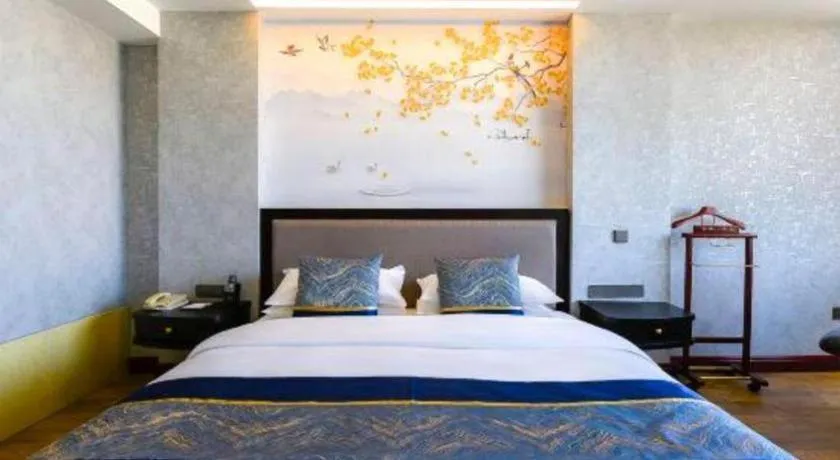 Bed in Junyu Grand Hotel Qinhuangdao