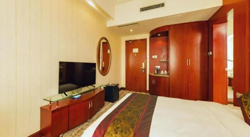 Bed in Junyu Grand Hotel Qinhuangdao