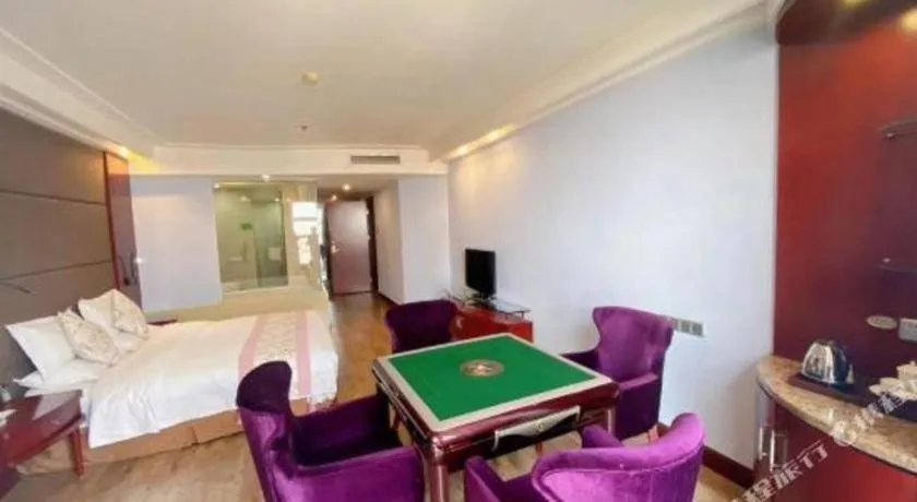 Bed in Junyu Grand Hotel Qinhuangdao