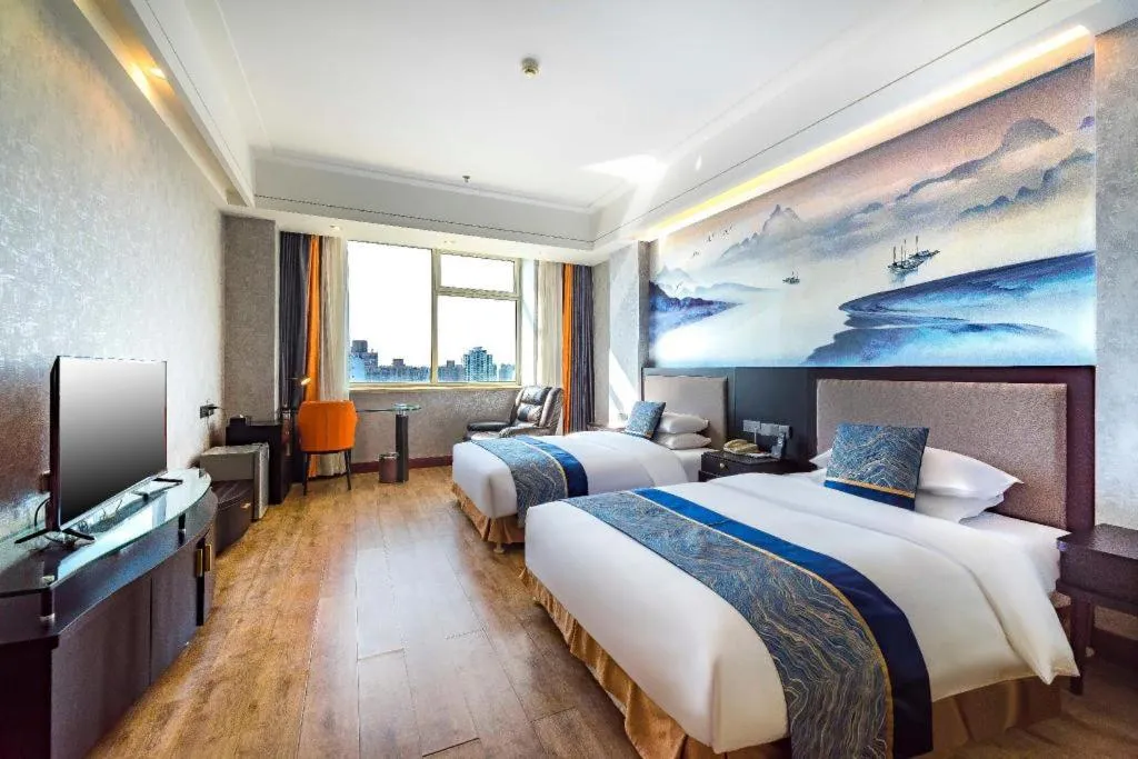 Bed in Junyu Grand Hotel Qinhuangdao