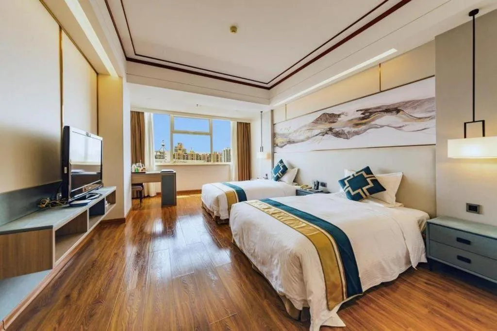 Bed in Junyu Grand Hotel Qinhuangdao