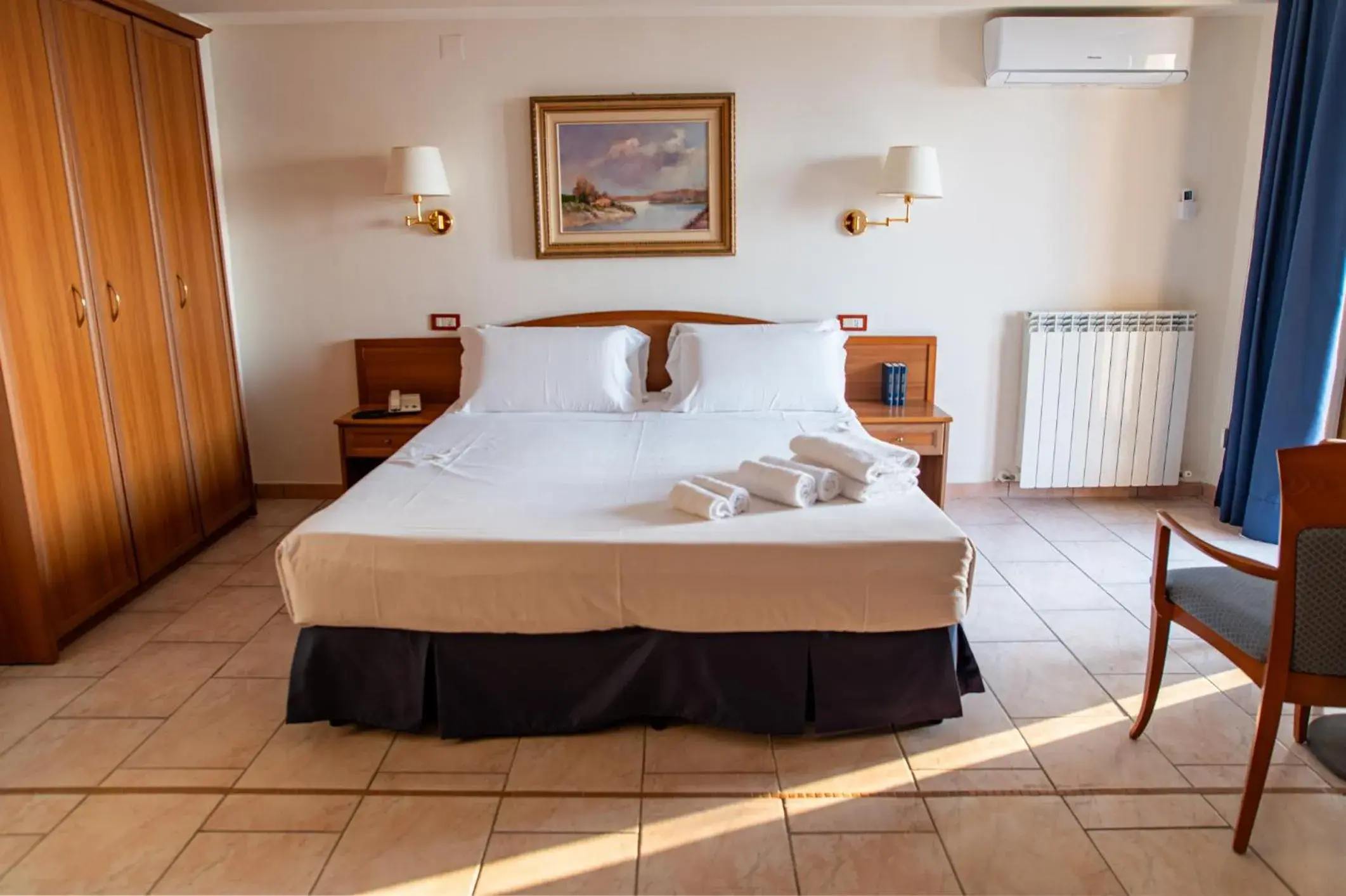 Classic Triple Room in Hotel Bisanzio Resort Classic Triple Room in Hotel Bisanzio Resort