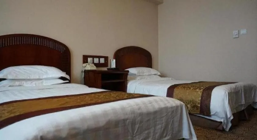 Bed in Heilongjiang Kunlun Hotel