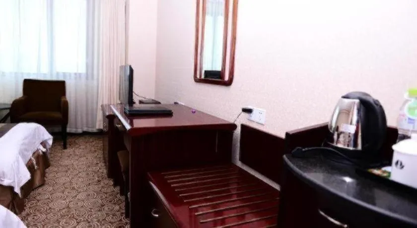 Bed in Heilongjiang Kunlun Hotel