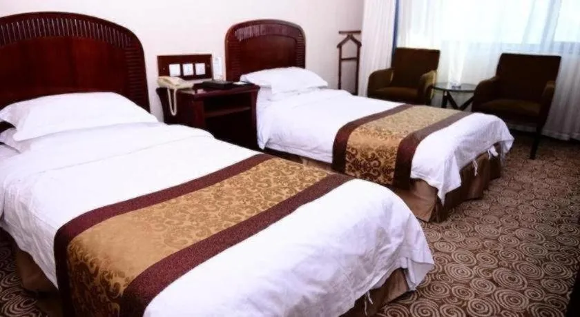 Bed in Heilongjiang Kunlun Hotel