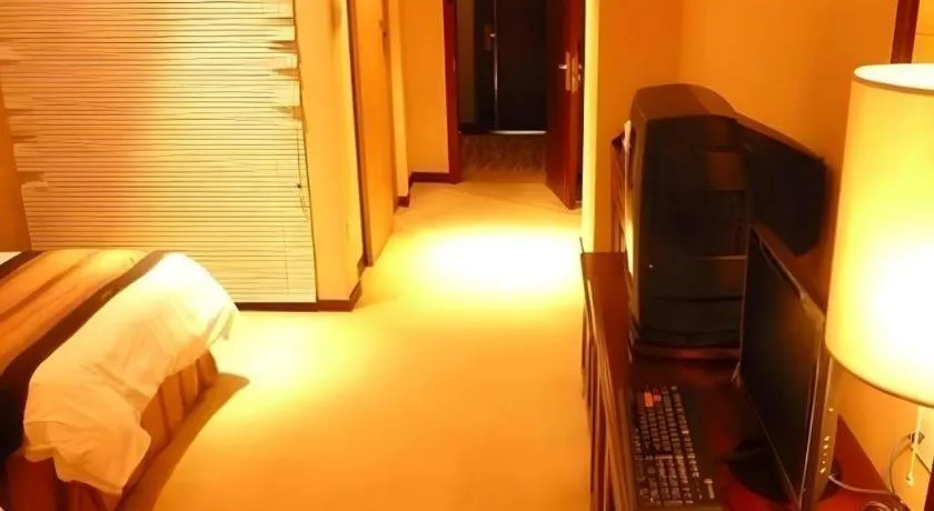 Bed in Heilongjiang Kunlun Hotel