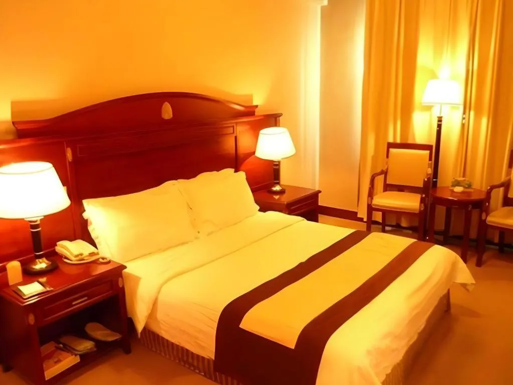 Bed in Heilongjiang Kunlun Hotel