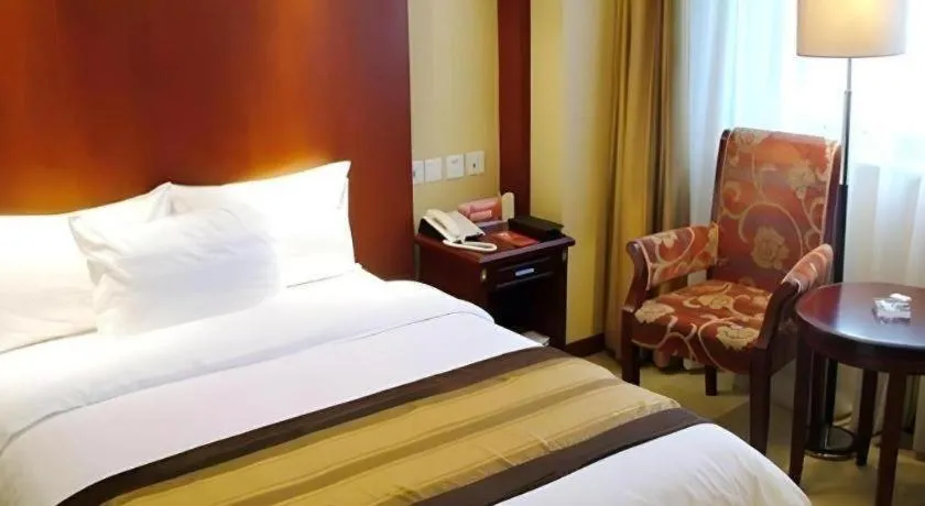 Bed in Heilongjiang Kunlun Hotel