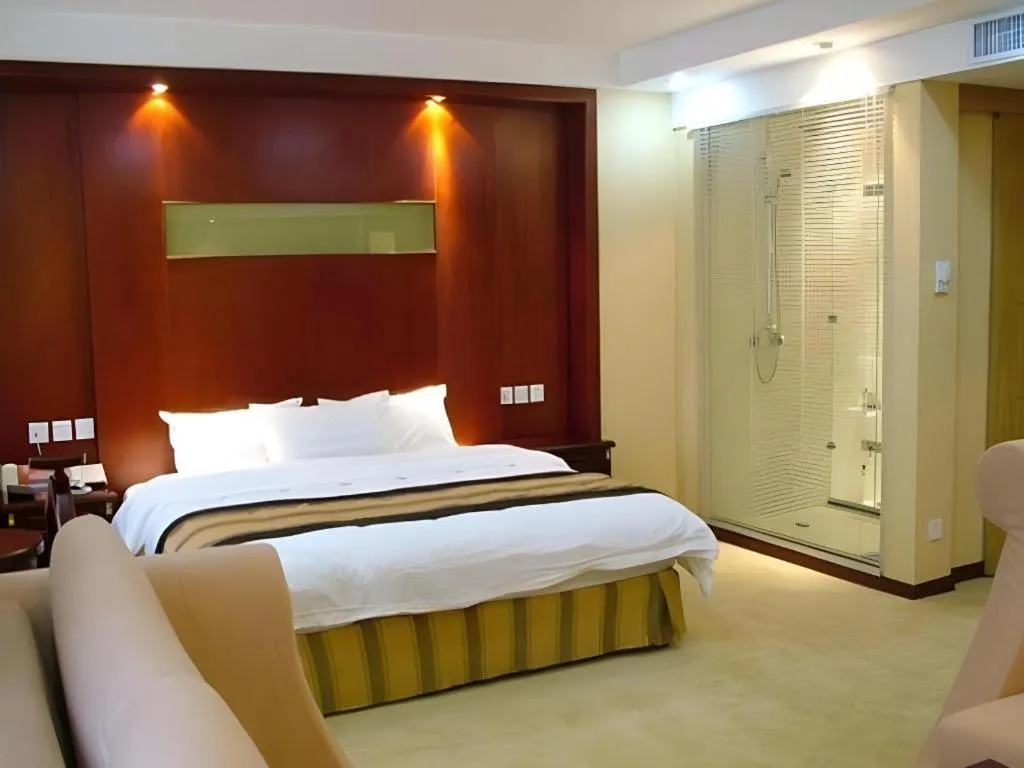 Bed in Heilongjiang Kunlun Hotel