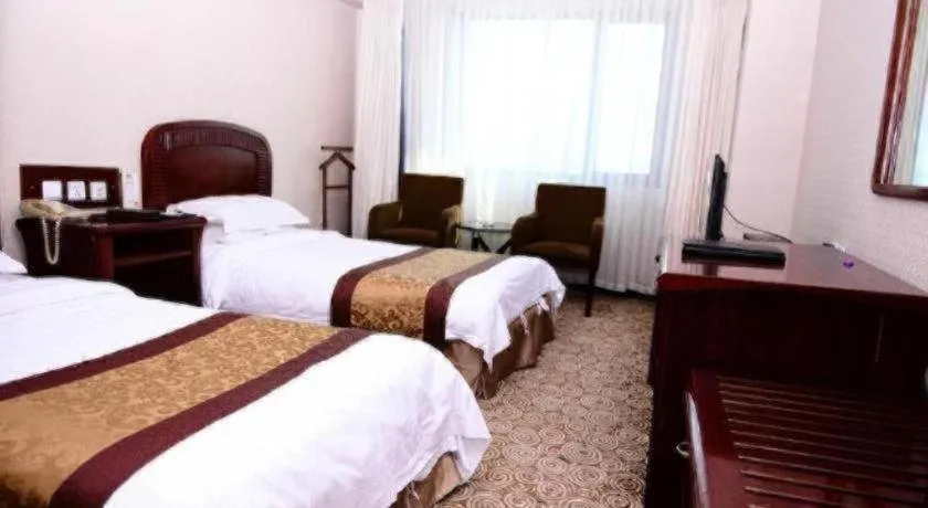 Bed in Heilongjiang Kunlun Hotel