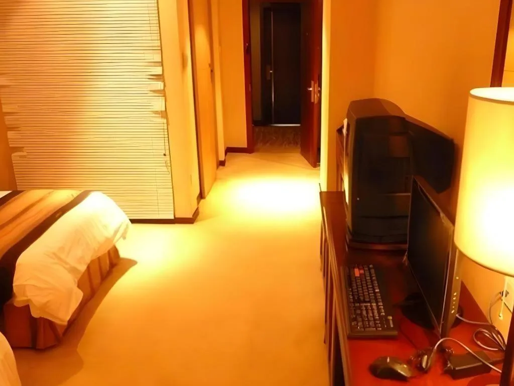 Bed in Heilongjiang Kunlun Hotel