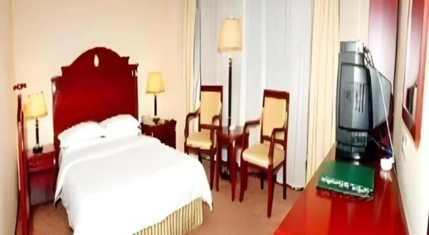 Bed in Heilongjiang Kunlun Hotel