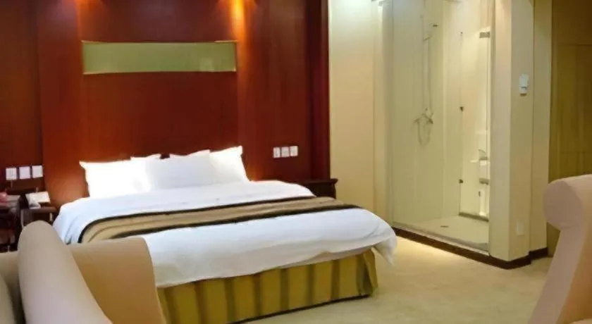 Bed in Heilongjiang Kunlun Hotel