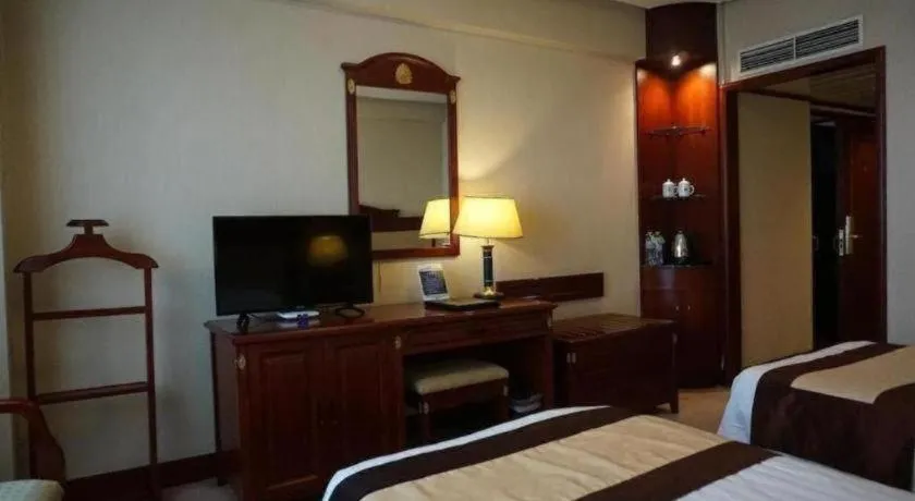 Bed in Heilongjiang Kunlun Hotel