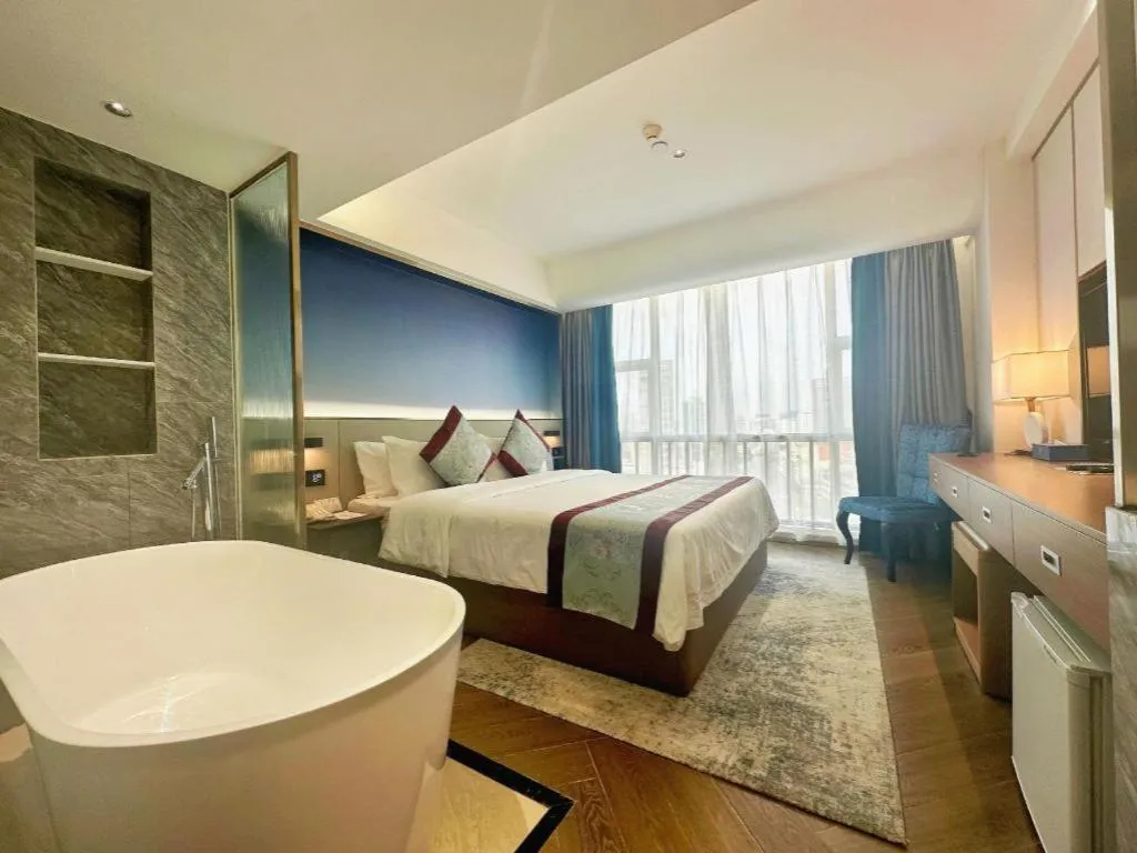 Bed in Xinyuan Hot Spring Hotel