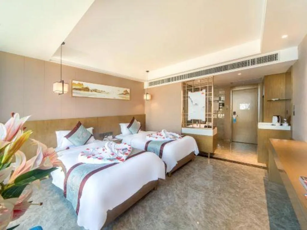 Bed in Xinyuan Hot Spring Hotel