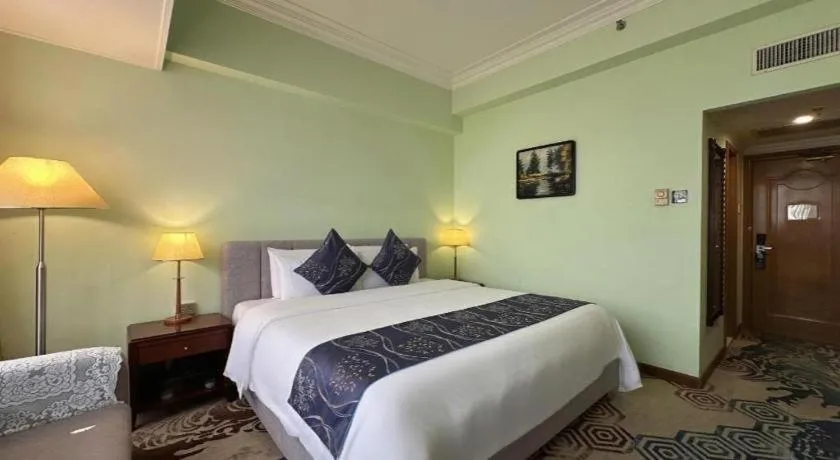 Bed in Xinyuan Hot Spring Hotel