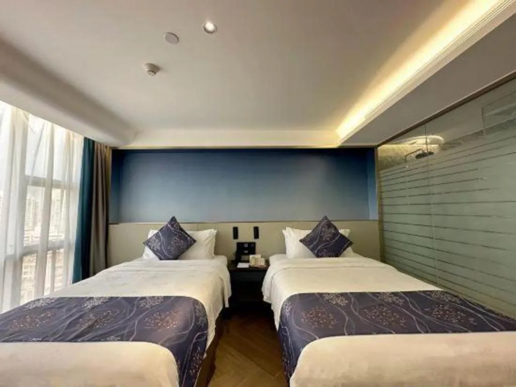Bed in Xinyuan Hot Spring Hotel