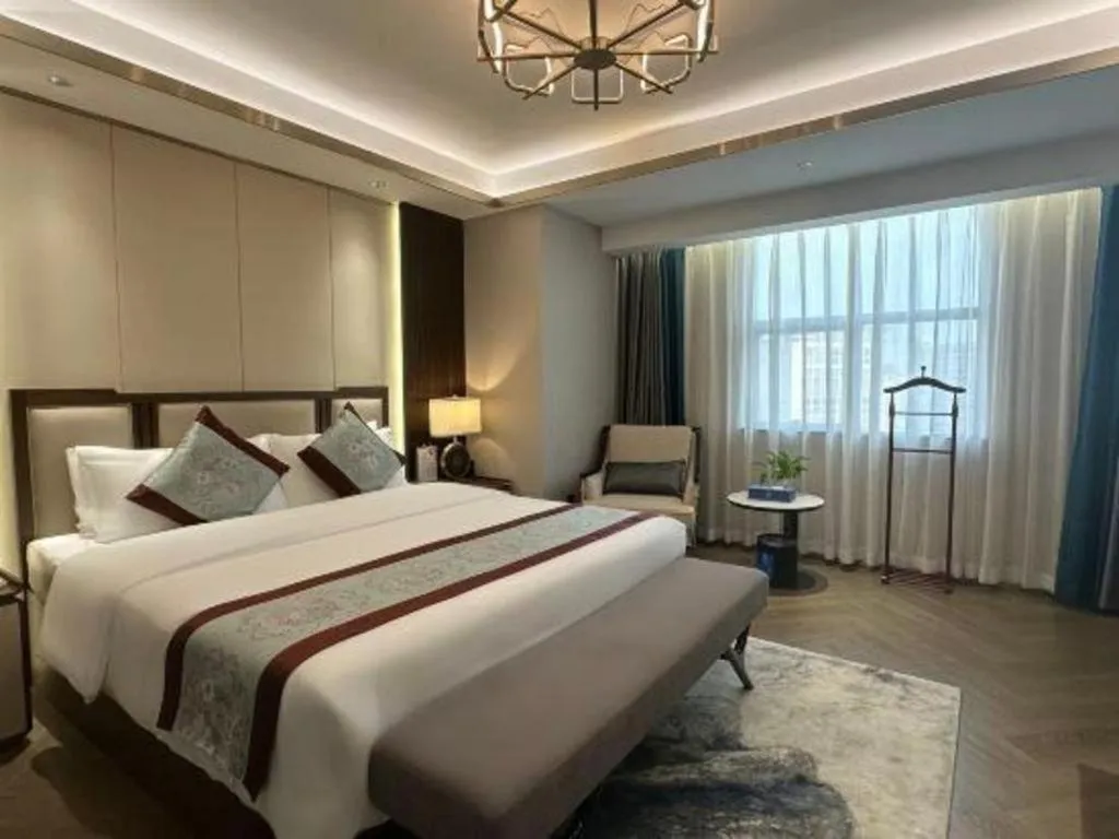 Bed in Xinyuan Hot Spring Hotel