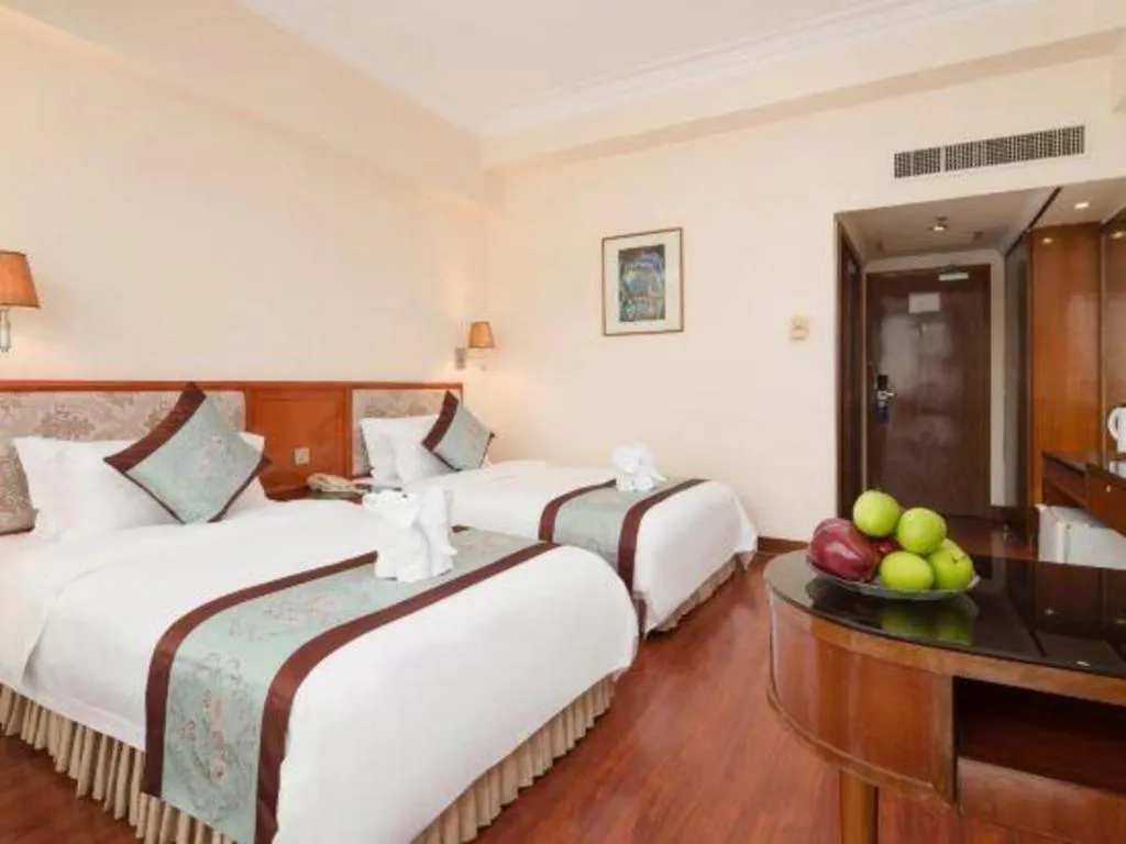 Bed in Xinyuan Hot Spring Hotel