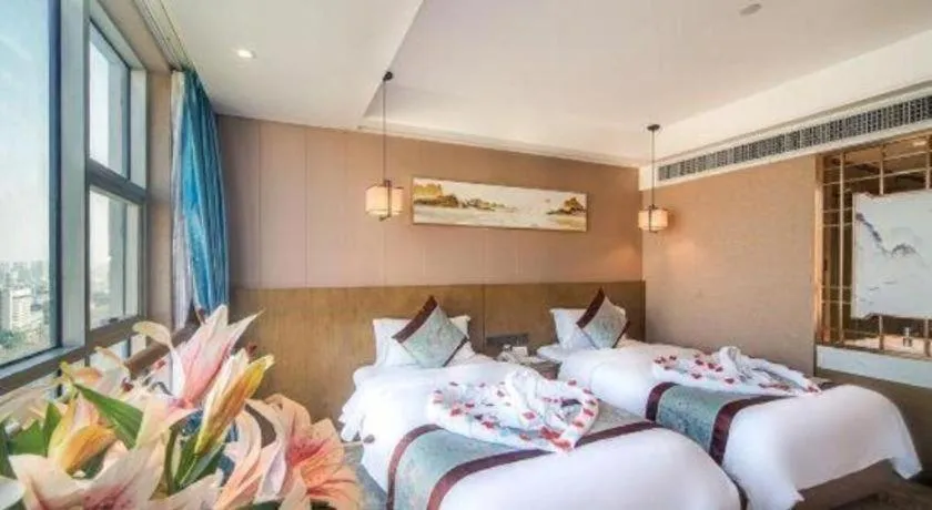 Bed in Xinyuan Hot Spring Hotel