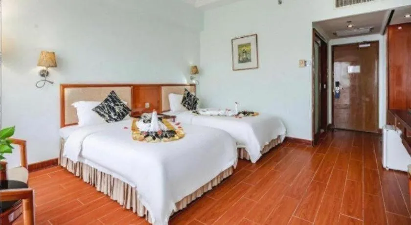 Bed in Xinyuan Hot Spring Hotel