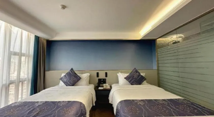 Bed in Xinyuan Hot Spring Hotel